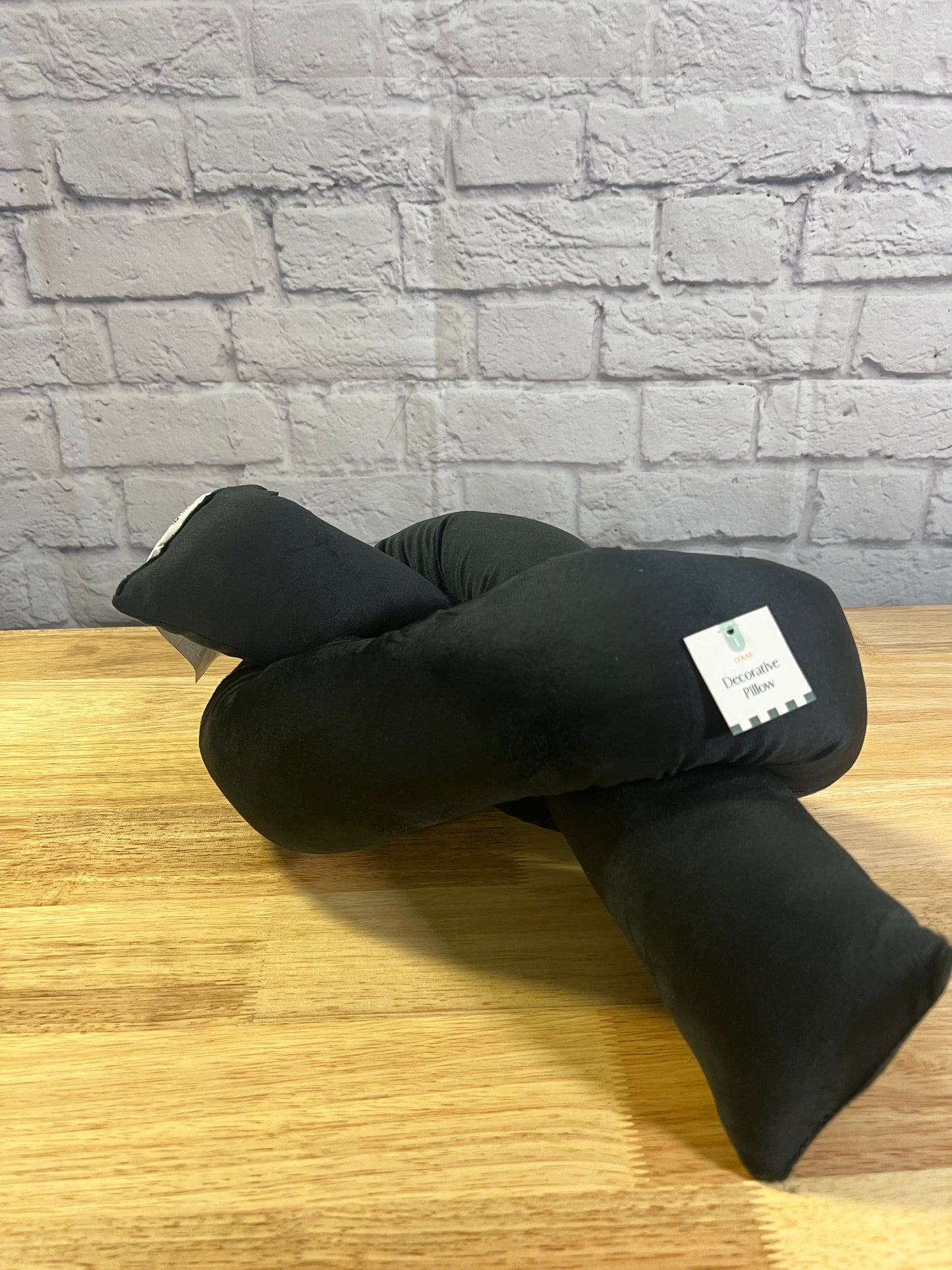 Two New Bullseye Playground Black Knot Throw Pillows